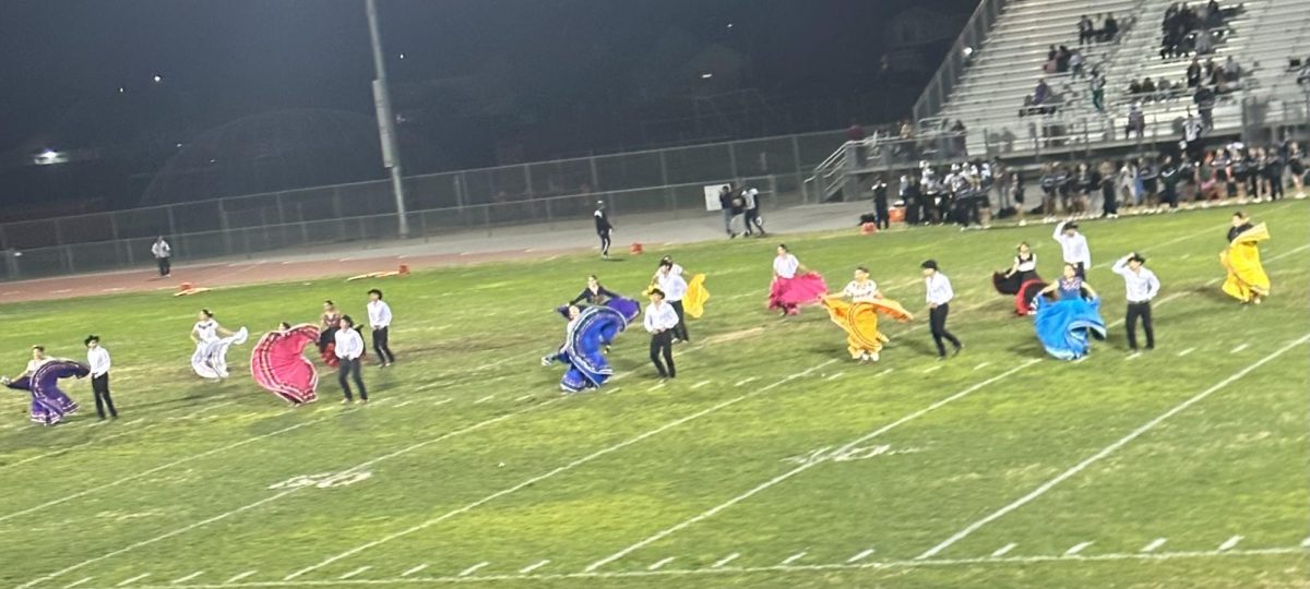 Ballet Folklorico performance by MECHA during the Cougar Football game at Hispanic Heritage Night. 
