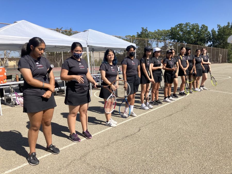 Girls tennis ready for first  serves.