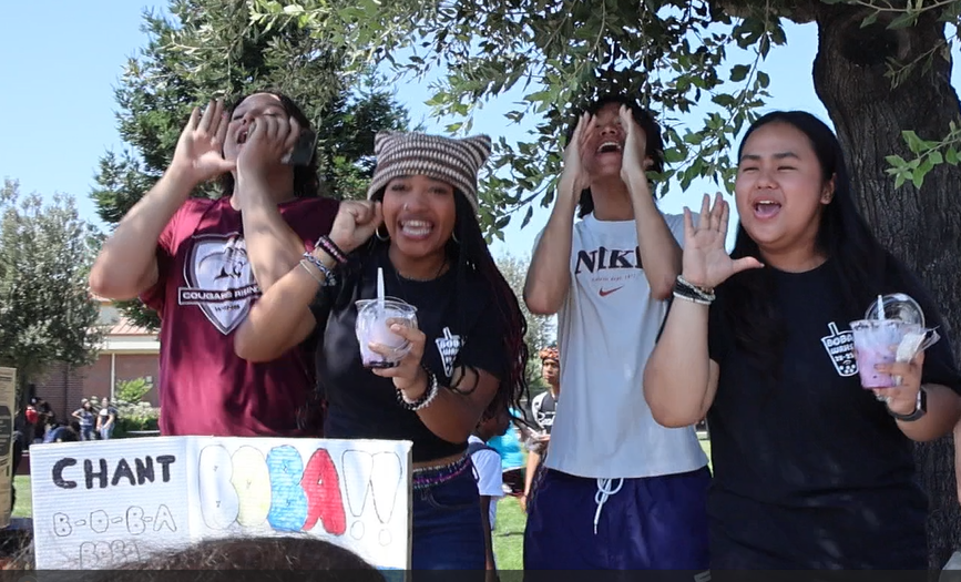 Josiah and friends call students to join Boba Club. 