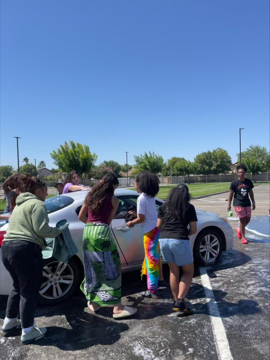 Poly club collaborates to wash cars, raising funds for Maui relief. 